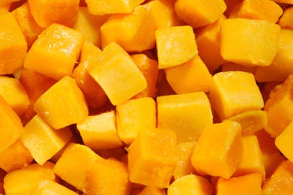 IQF mango dices, deep gold and evenly cut