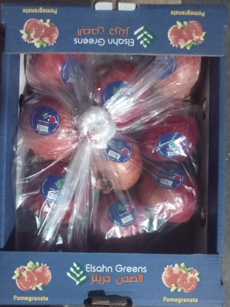 An Elsahn Greens pomegranate carton packed and ready to close